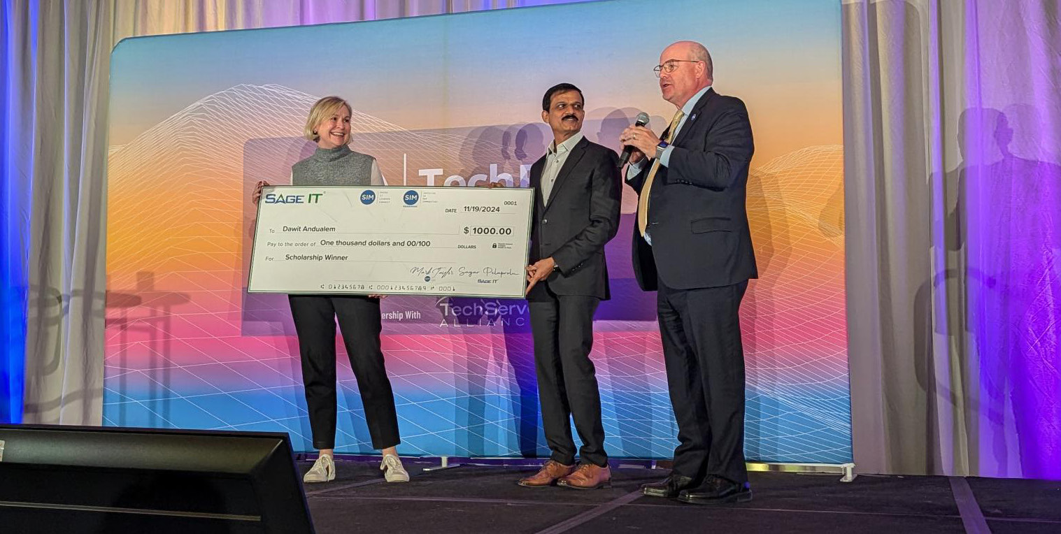 Sagar Pelaprolu at a SAGE IT and SIM Foundation scholarship presentation at SIM TechExec 2024