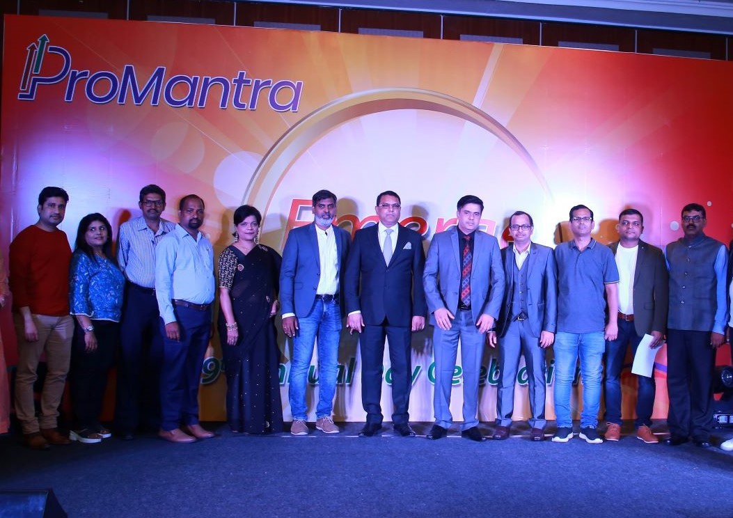 Sai Giridhar Chintamaneni with a group onstage at Promantra’s 2022 annual day
