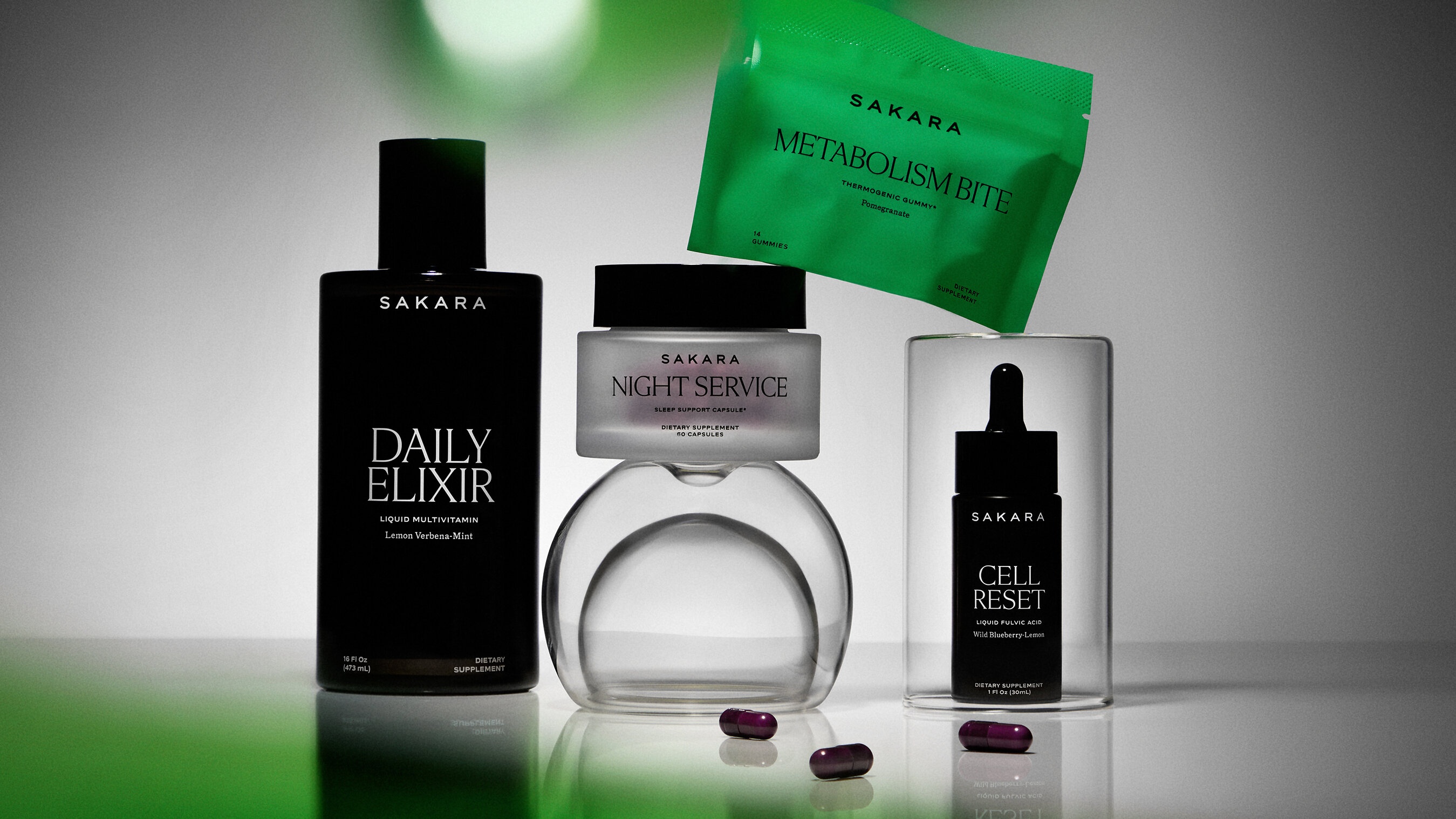 Sakara supplement gummies and capsule products arranged together