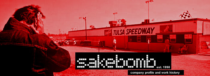 Archived Sakebomb company profile banner showing a photographer outside Tulsa Speedway beneath the Sakebomb wordmark