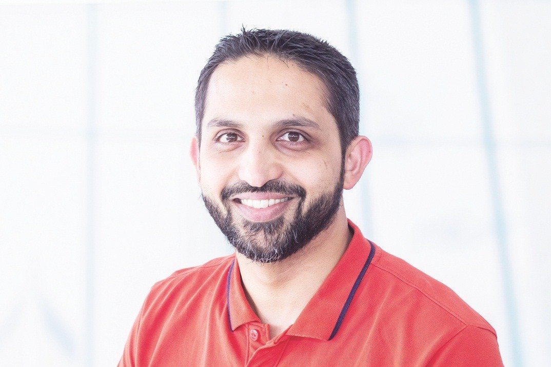 Salil Talauliker in a red polo shirt, photographed for Business Goa