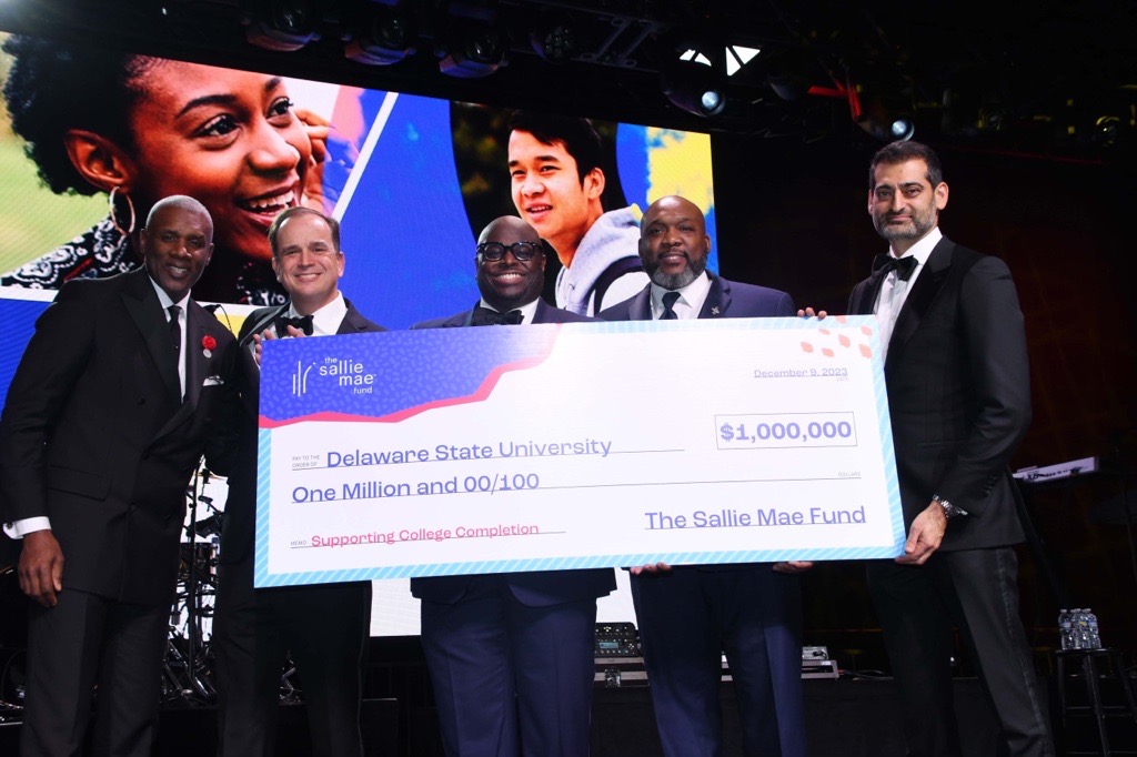 Sallie Mae representatives at a Delaware State University check presentation
