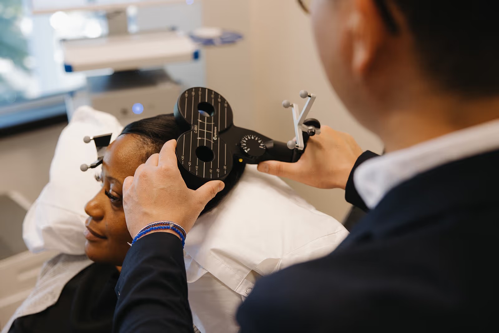 A patient receiving TMS treatment at Salma Health
