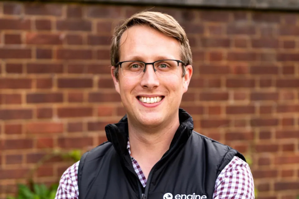 Sam Everington outdoors wearing glasses and an Engine-branded gilet
