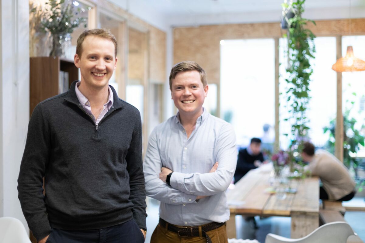 Will Leeming, left, and Sam Glasswell, right, standing in an office