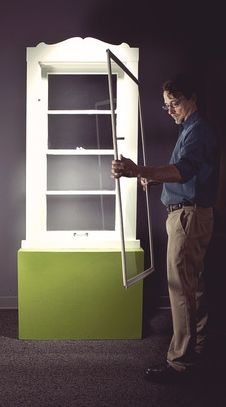 Sam Pardue installing an early Indow window insert
