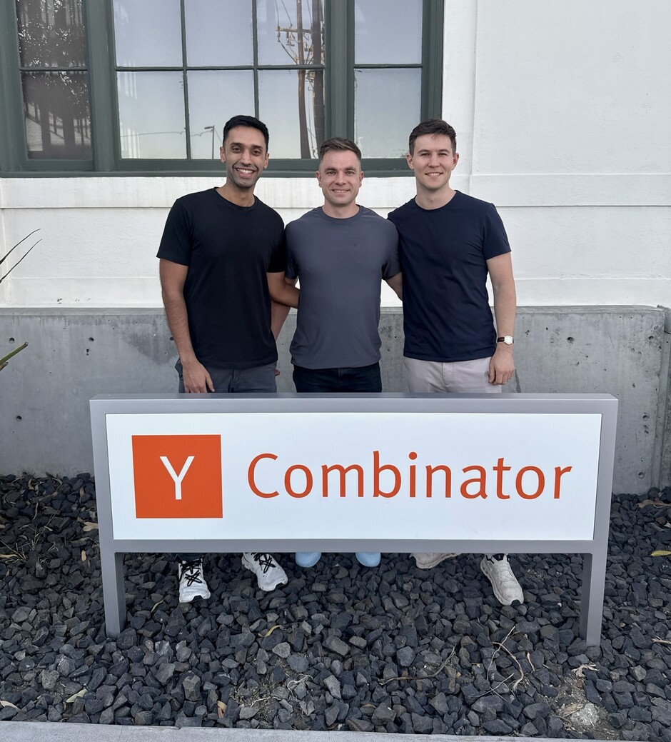 The three Arctic Health co-founders standing behind a Y Combinator sign