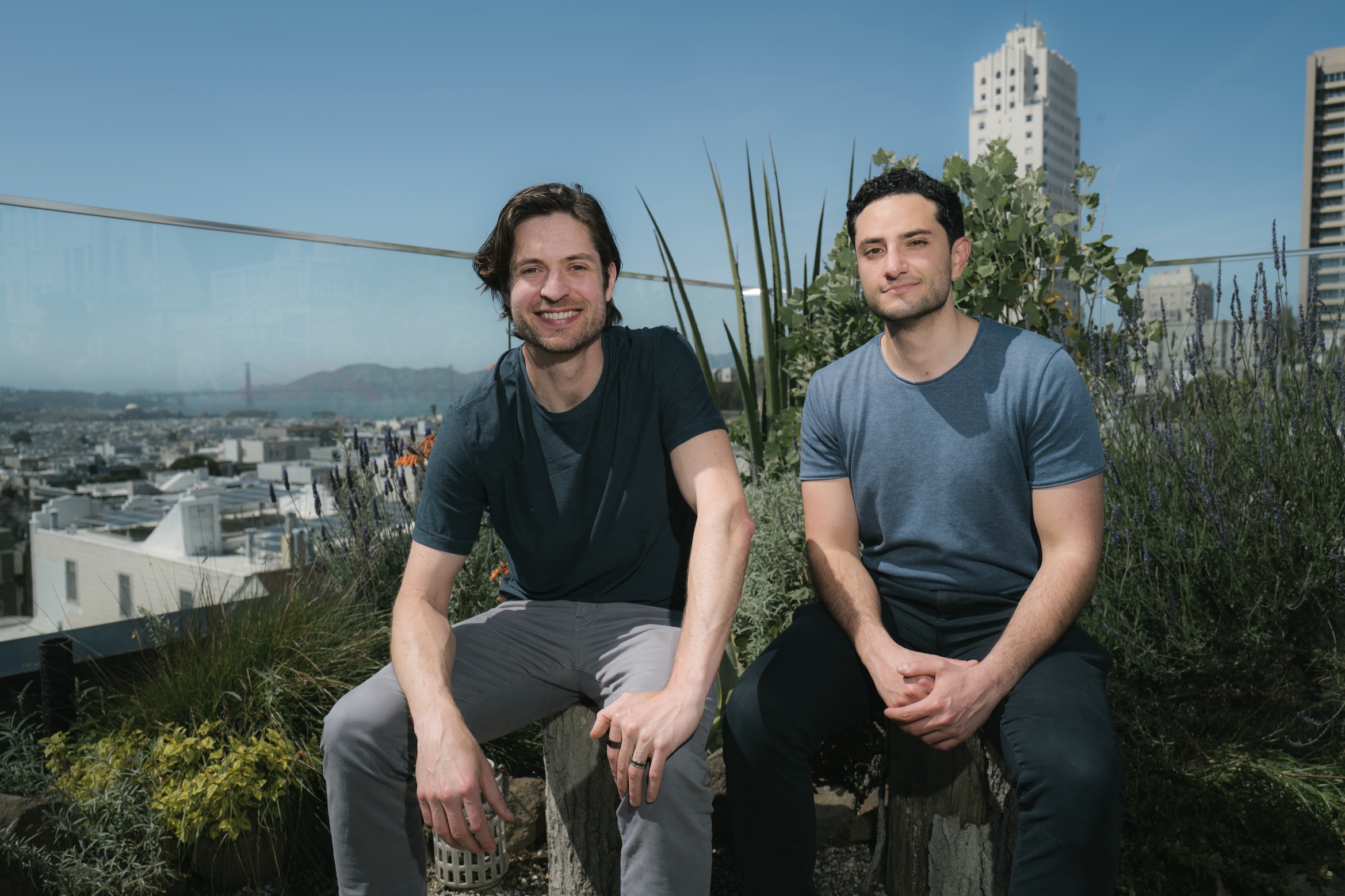 Fay co-founders Mark Stefanski, left, and Sammy Faycurry, right, seated outdoors in San Francisco