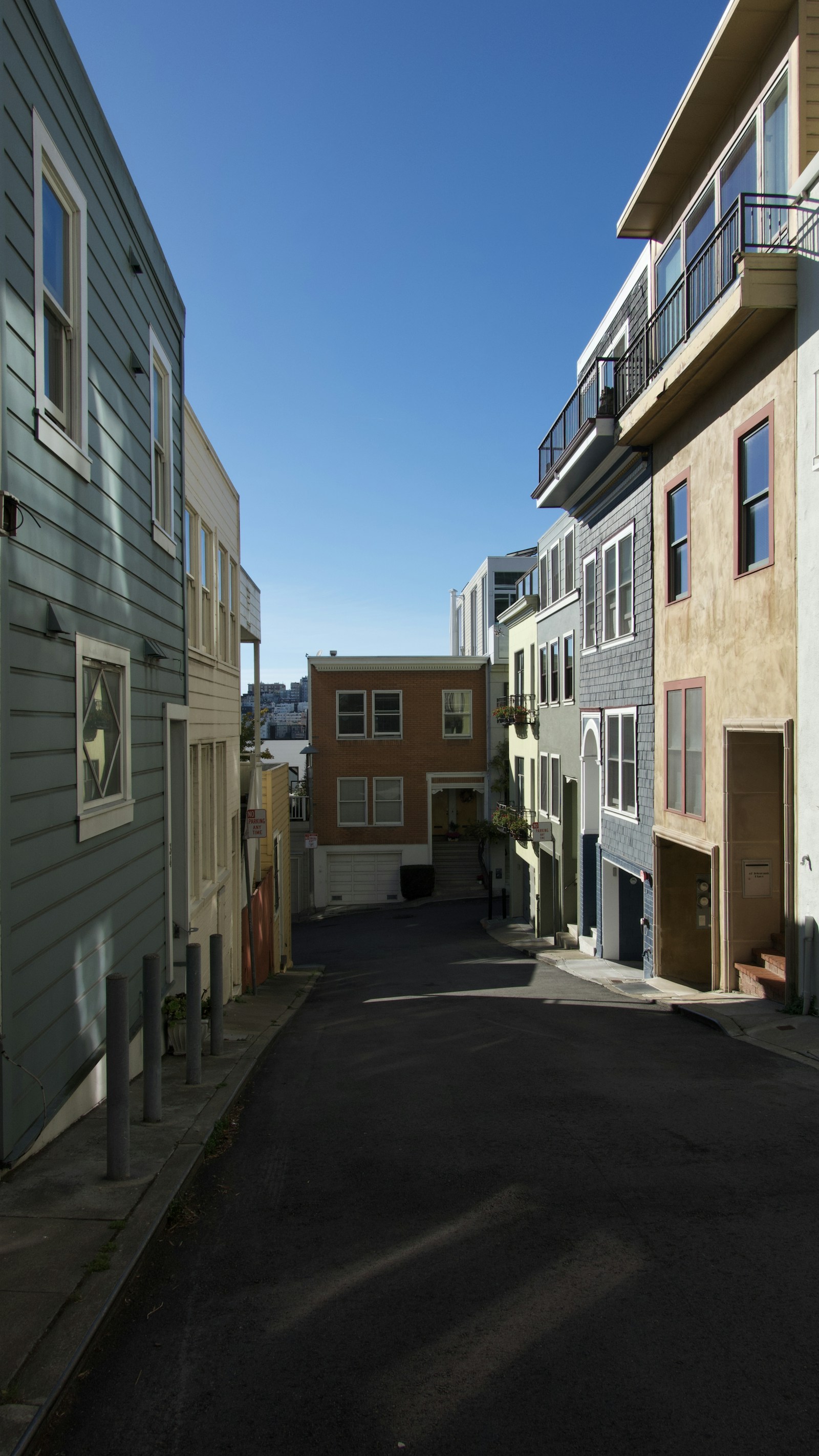 Colorful homes lining a narrow Telegraph Hill street