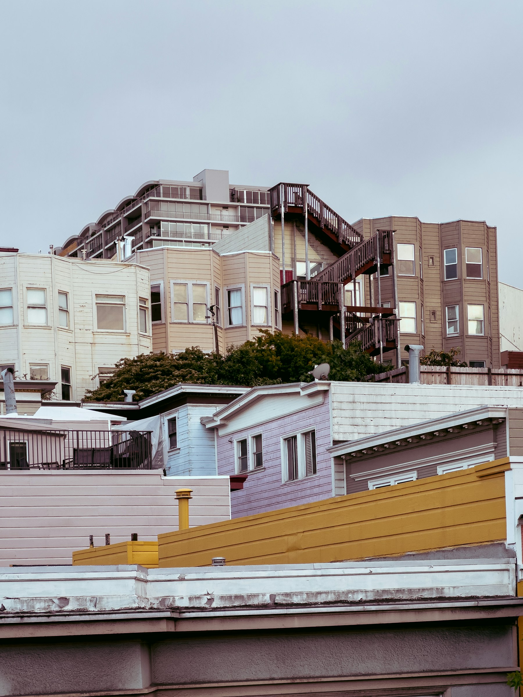 Dense rows of homes climb a San Francisco hill