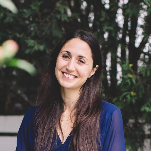 Sandra Abrevaya smiling in an outdoor portrait