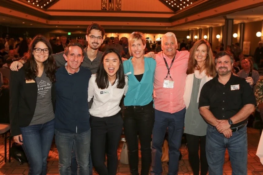 An archival group photograph of the Santa Cruz New Tech community