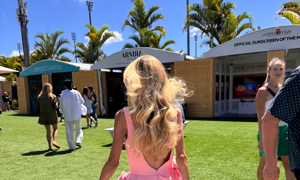 Sarah Rahal walking toward the ARMRA suite at the Miami Open