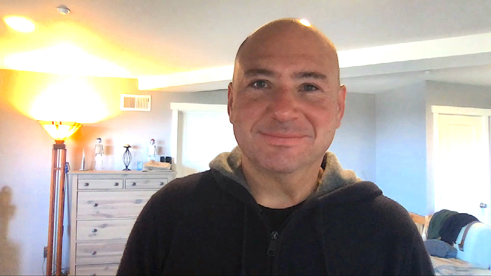 Sasha Kipervarg speaking remotely during a 2020 Cloud Native Insights interview
