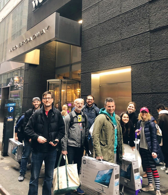 Satisfi Labs team members gathered on a New York sidewalk