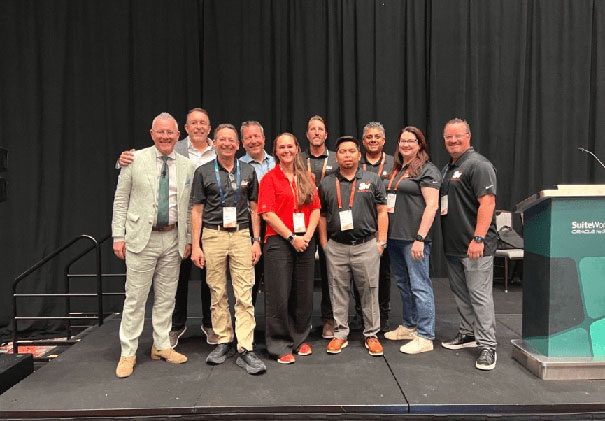 ScaleNorth team gathered onstage at SuiteWorld for BPO partner recognition