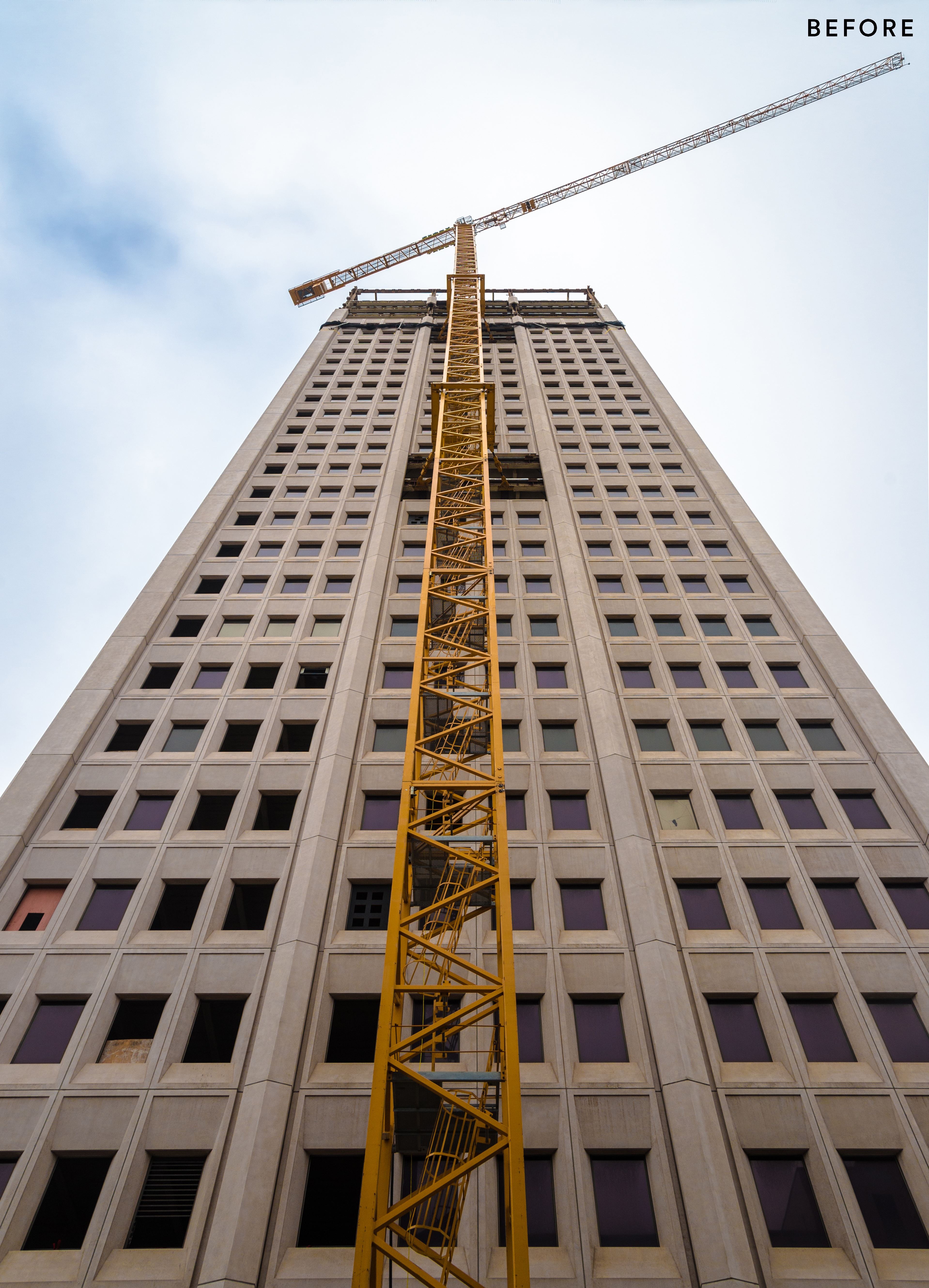 100 Van Ness before conversion, with its earlier concrete office façade