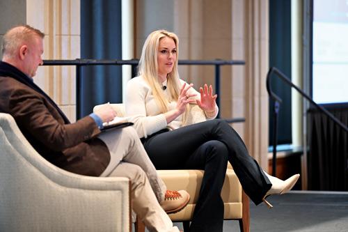 Scott Dahnke, seated at left, interviewing Lindsey Vonn at Notre Dame