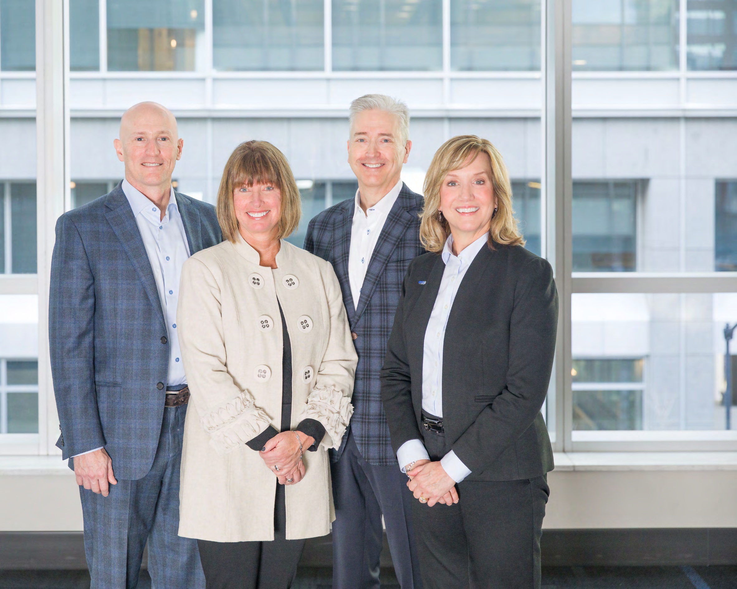 Scott Jean with EMC executive colleagues Ann Collins, Todd Strother and Beth Nigut