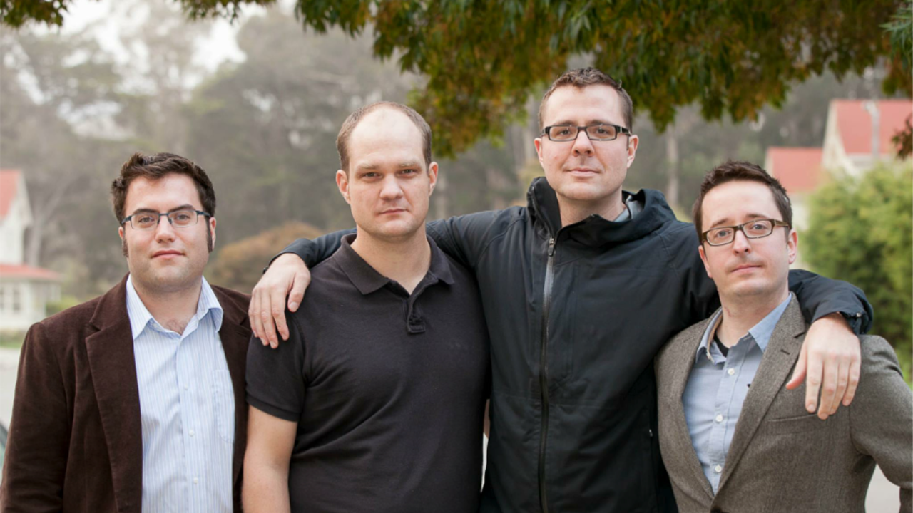 Urban Airship co-founders Michael Richardson, Steven Osborn, Scott Kveton and Adam Lowry standing together outdoors