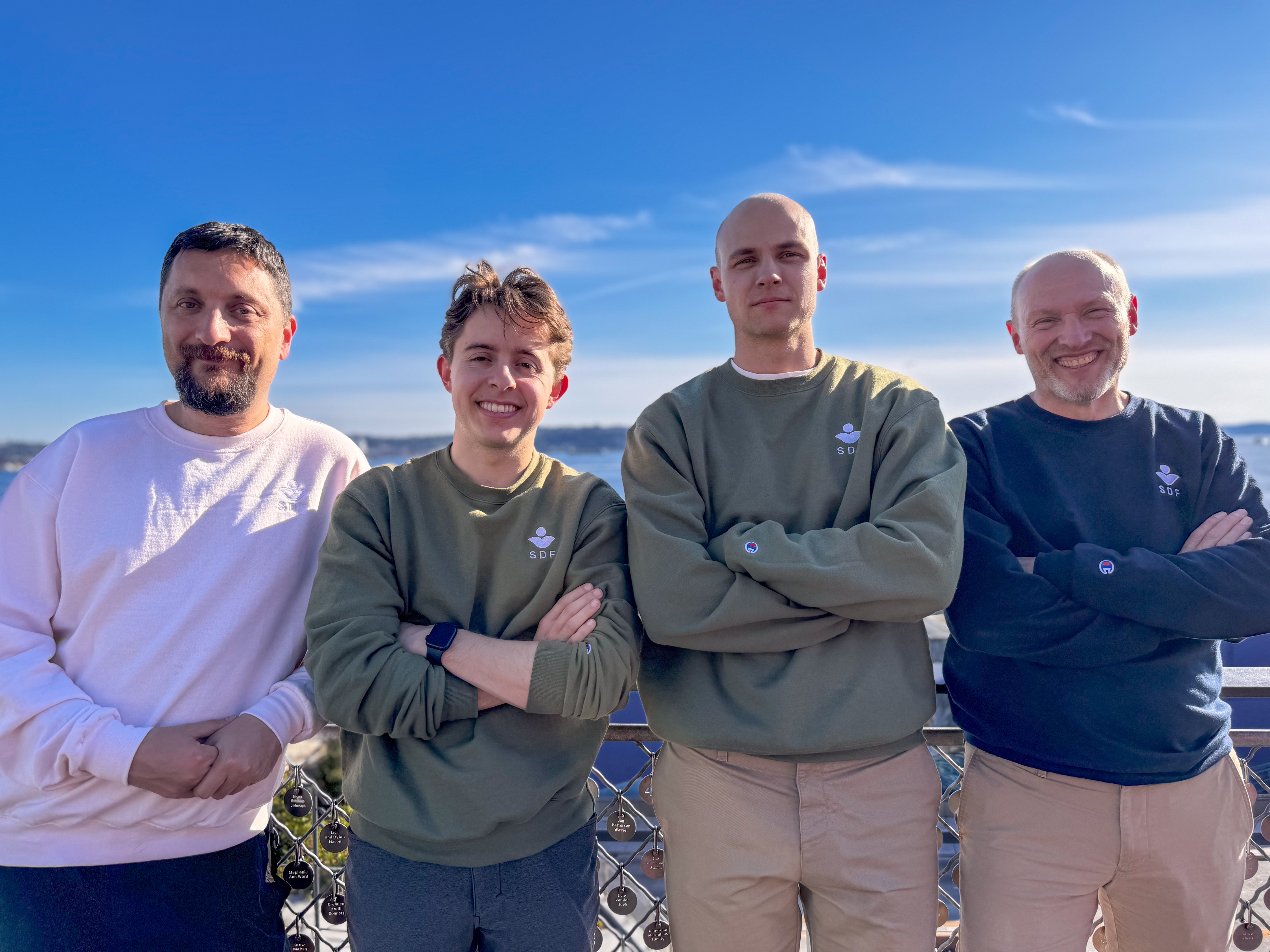 SDF co-founders Michael Levin, Elias DeFaria, Lukas Schulte and Wolfram Schulte standing together outdoors