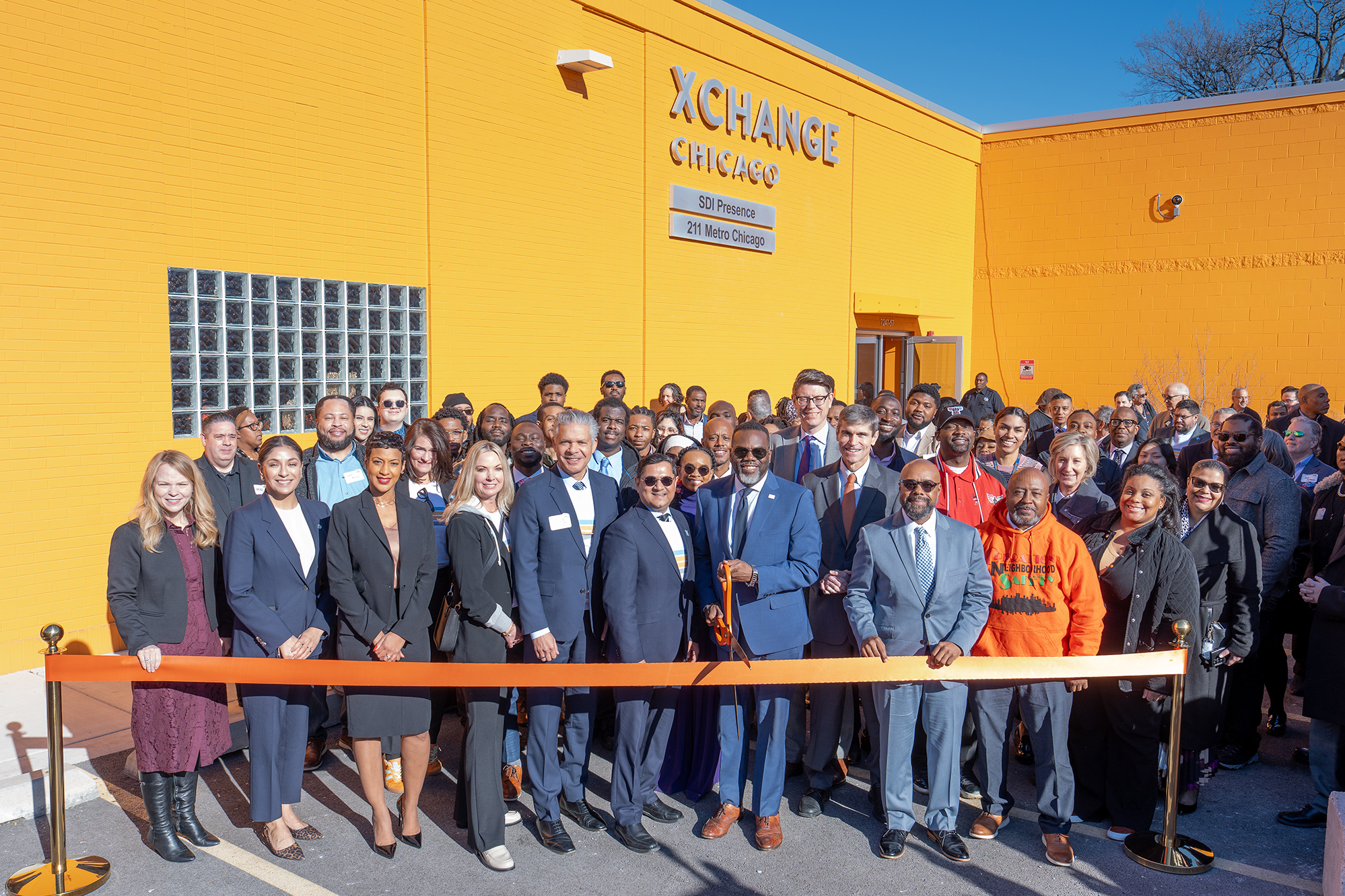 Participants gathered for the ribbon cutting at Xchange Chicago