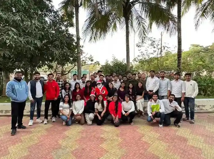 SDLC Corp team gathered outdoors for a group photograph
