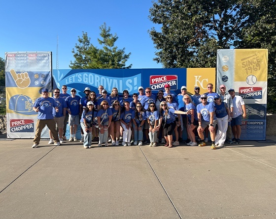 DMH colleagues gathered for a group photograph at a Royals summer outing