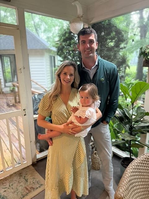 Sean McGinty with his wife Hannah and daughter Jane at home