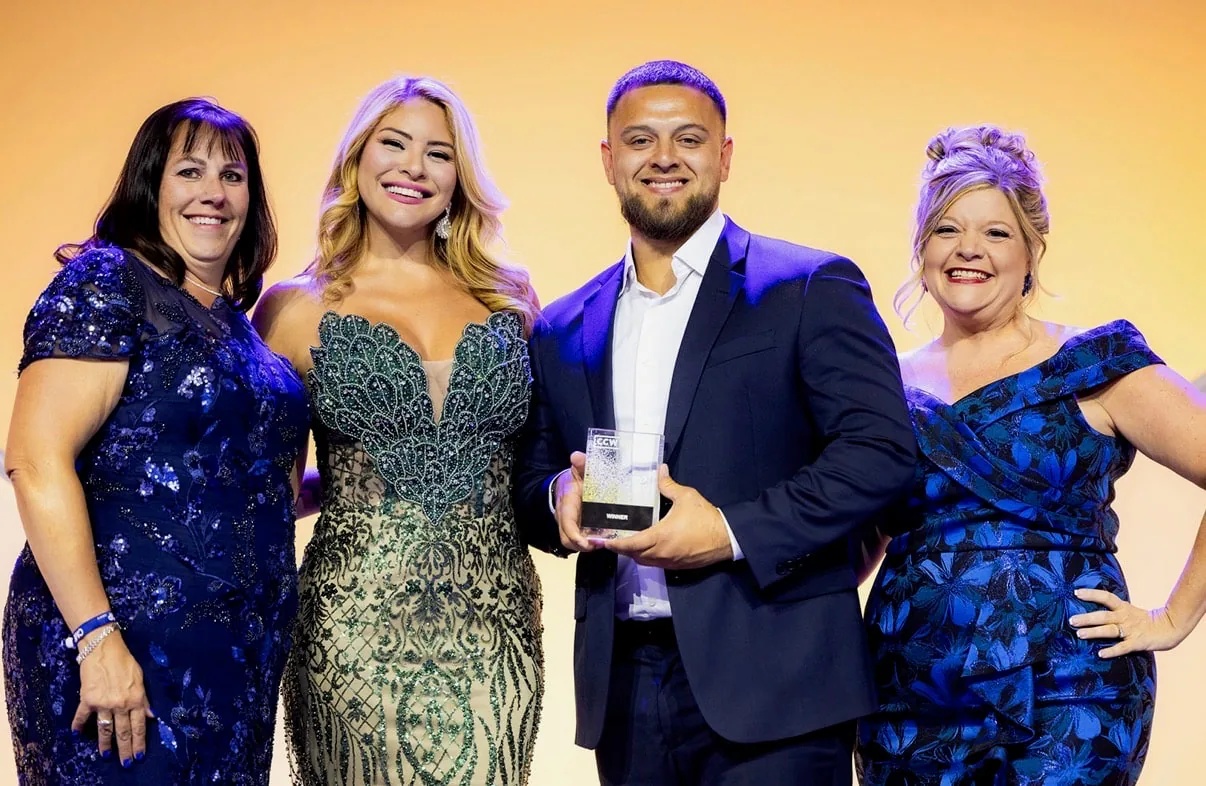 Four AmplifAI team members posing with the 2026 CCW award