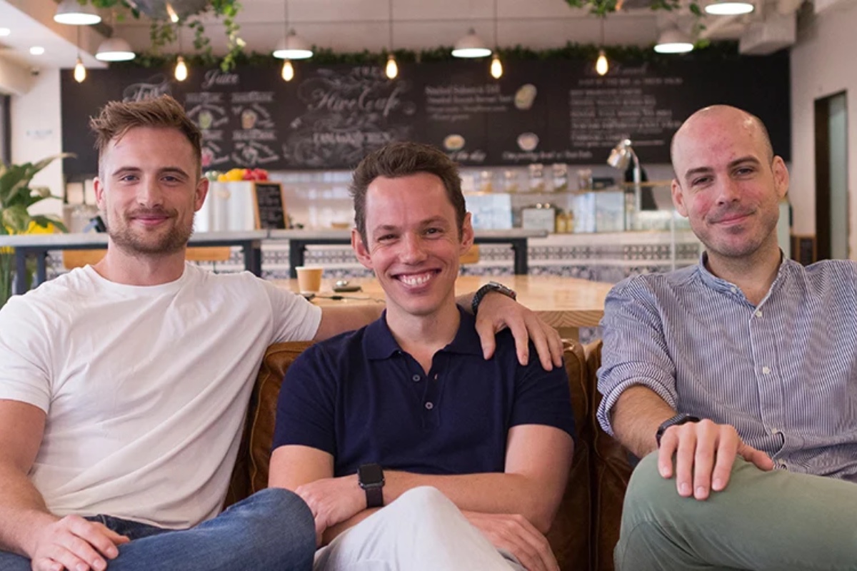 Seb Poole seated in the center with two colleagues during his Frankie years