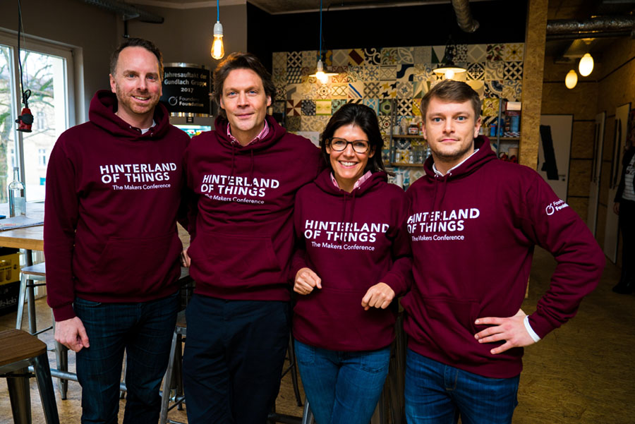 Dominik Gross, Sebastian Borek, Viktoria Schünemann and Jannis Johannmeier in burgundy Hinterland of Things hoodies