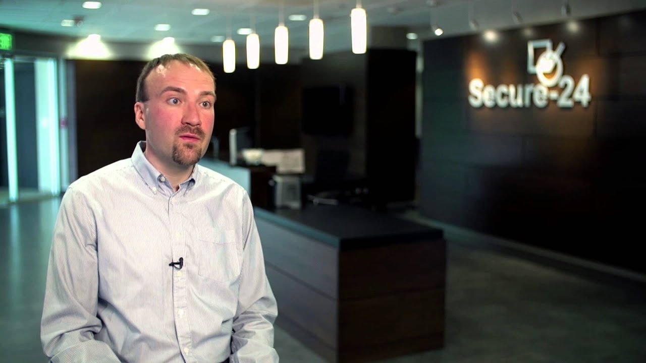 Interview participant in Secure-24’s office, from a Red Hat customer video