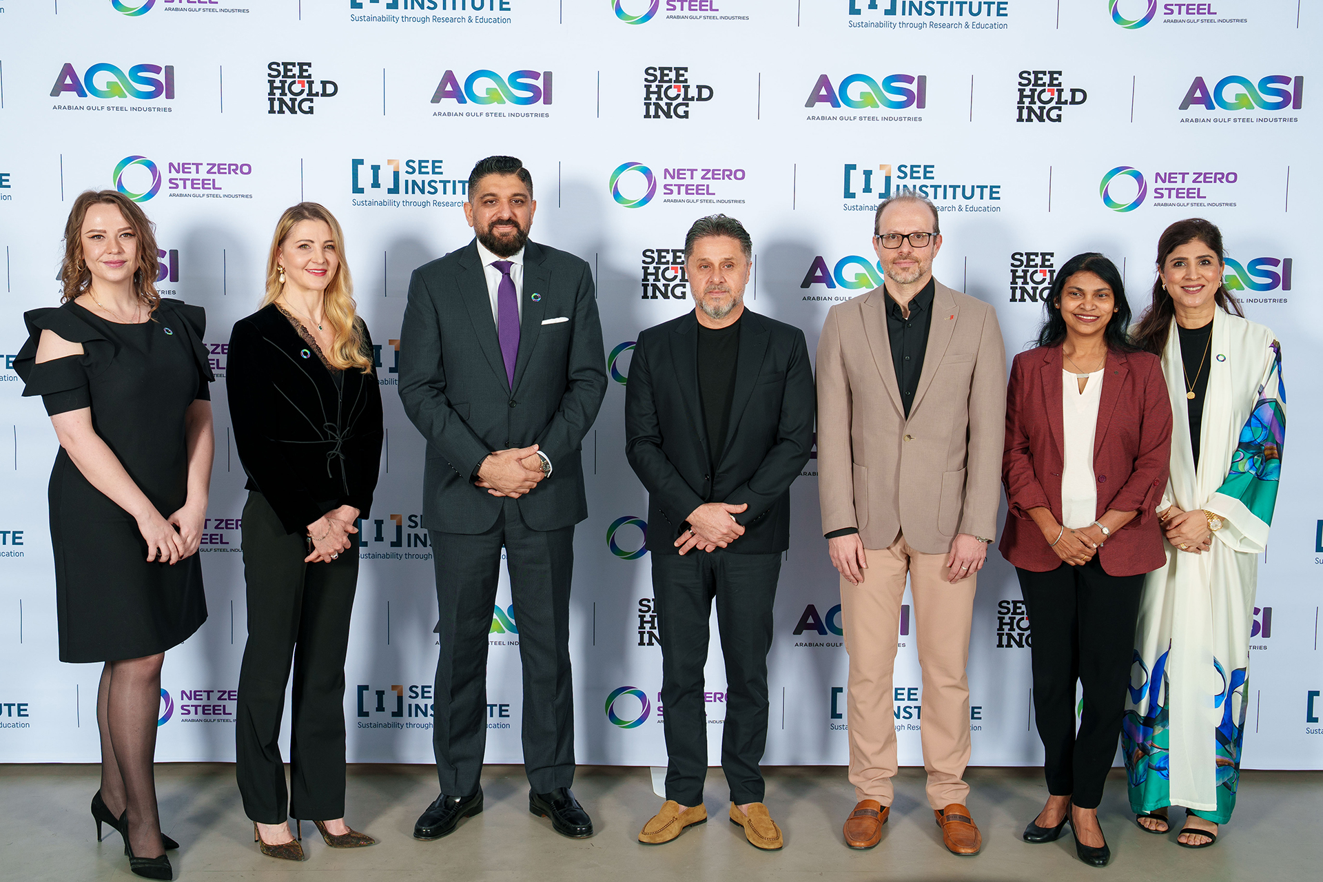 A group at the SEE Holding and Arabian Gulf Steel Industries partnership announcement at SEE Institute