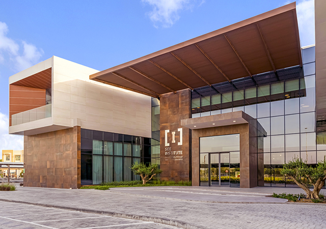 SEE Institute’s entrance, with a broad projecting roof and glazed facade