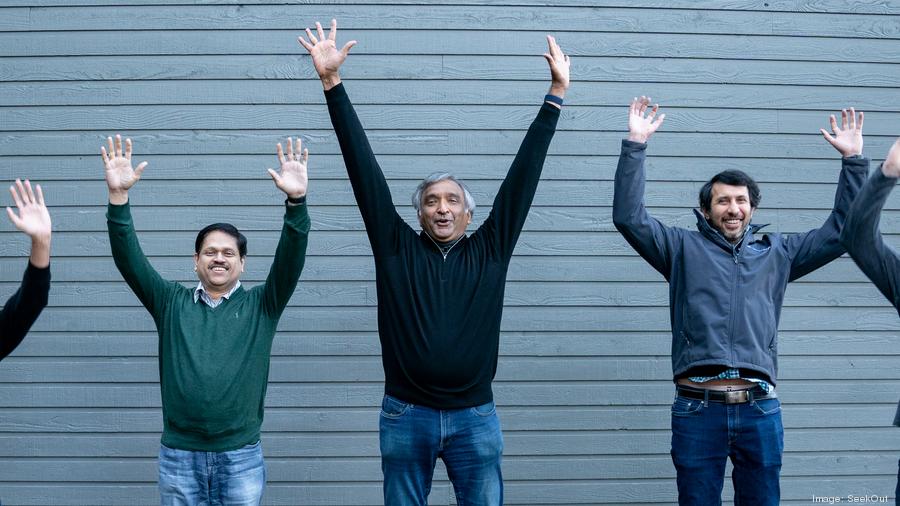 Members of SeekOut's founding team celebrating together