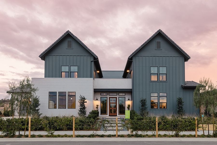 Two-story SHAWOOD home at Sommers Bend illuminated at dusk