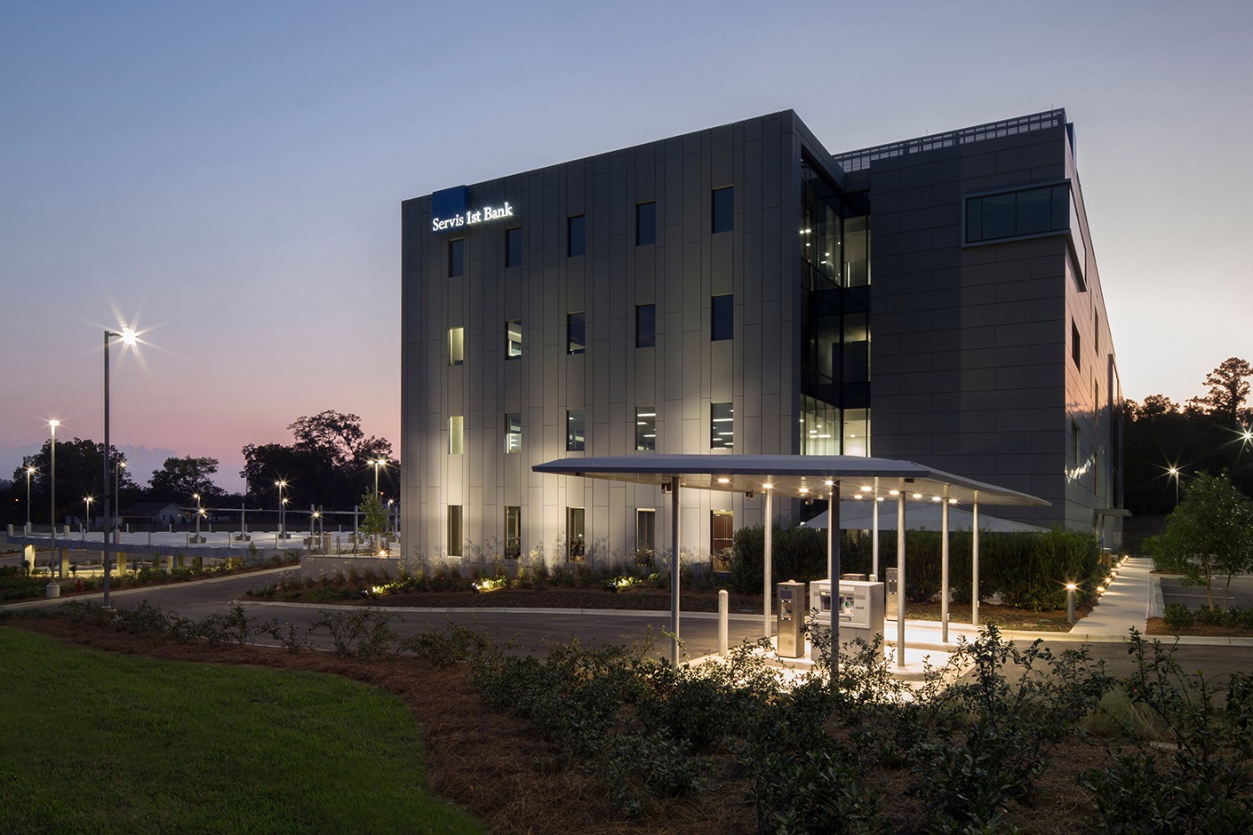 ServisFirst Bank headquarters in Homewood, Alabama, illuminated at dusk