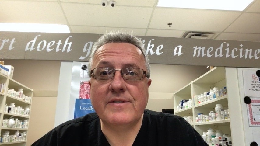 A pharmacy representative speaking from behind the counter in ServRx’s PFOA video testimonial