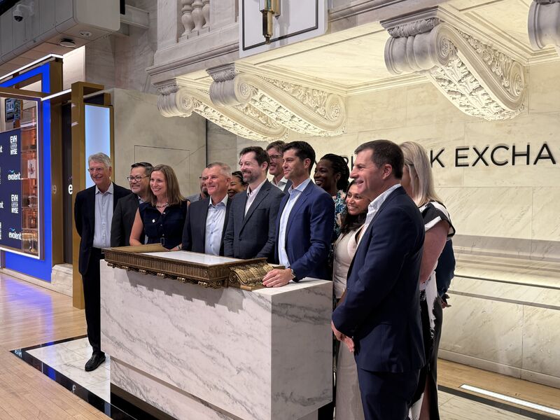 Evolent colleagues gathered around the NYSE bell podium during the company's 2025 anniversary visit