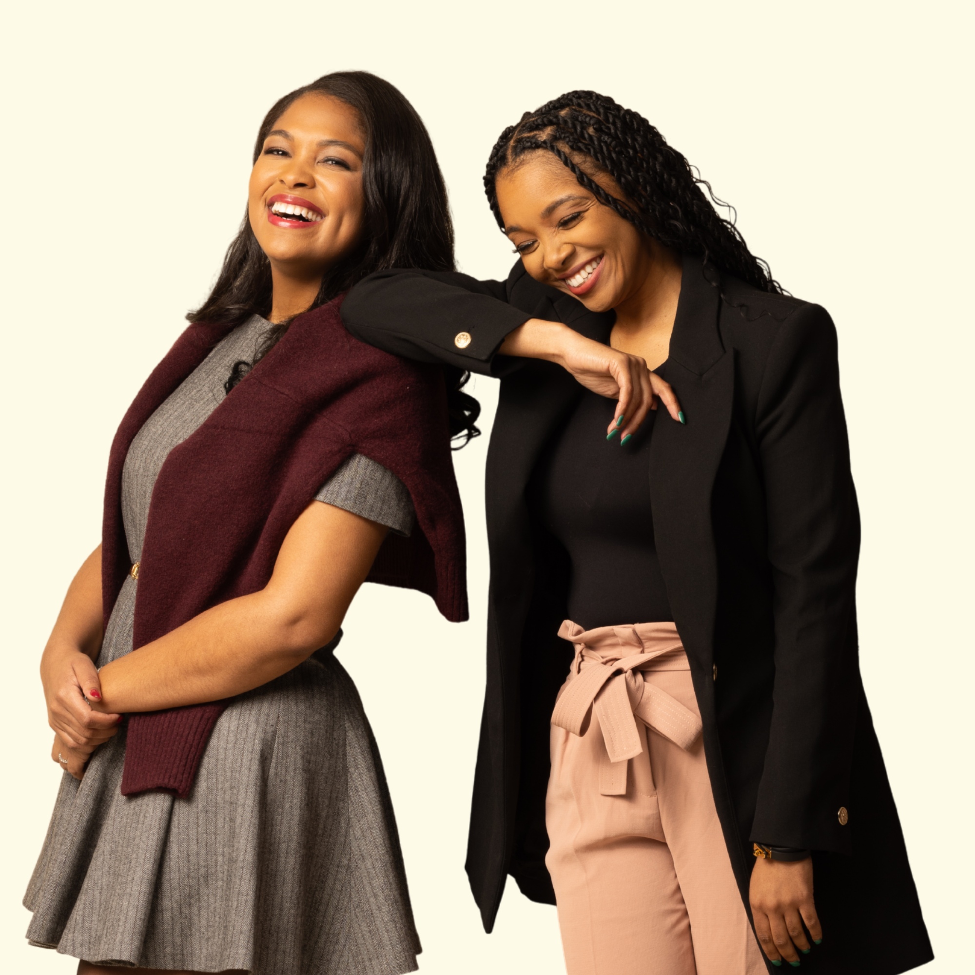 Sevetri Wilson Taylor, left, and Rich Lessons co-host Sheena Allen, right, laughing together