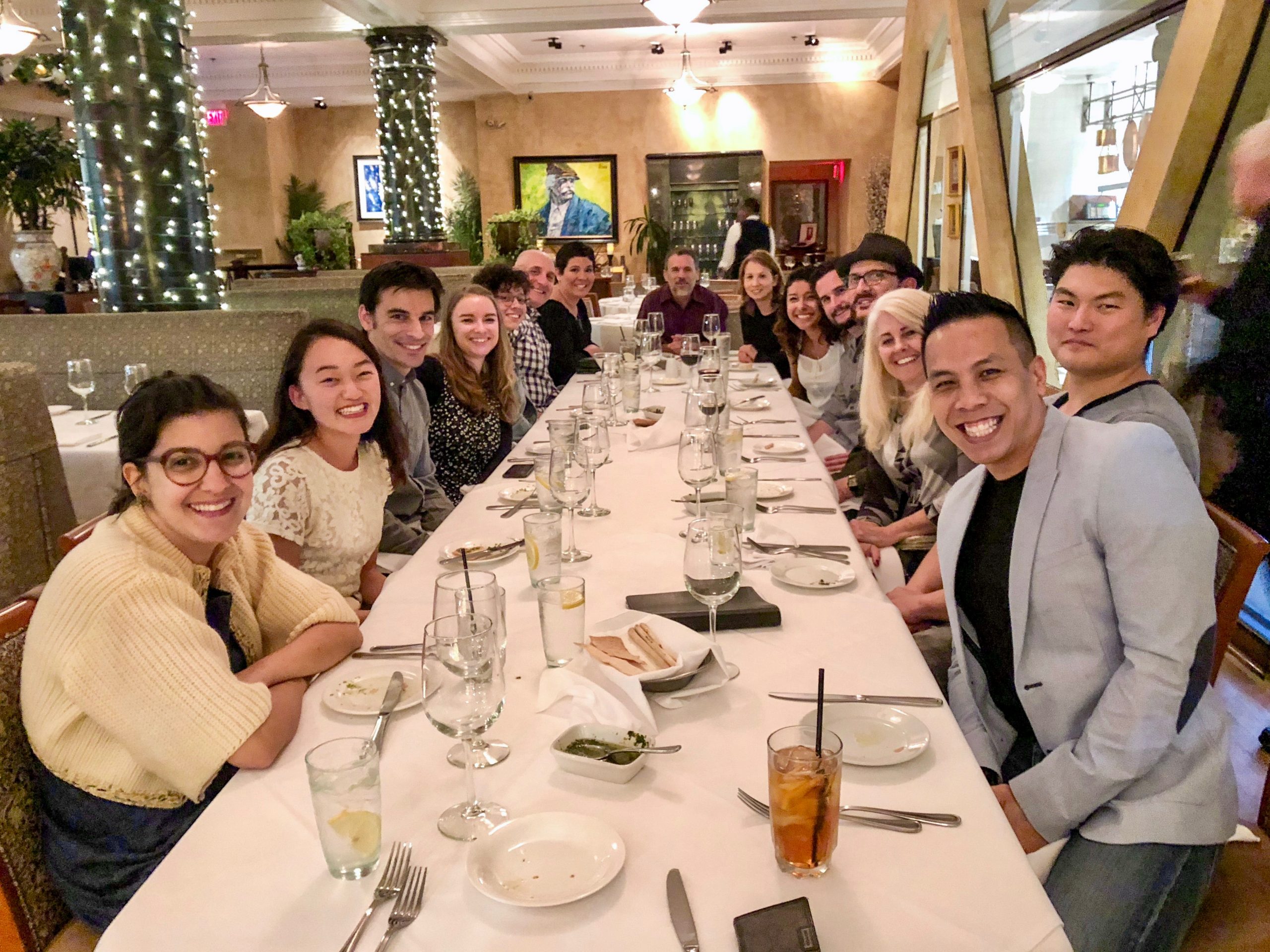 SGA colleagues gathered around a table at their 2017 Christmas dinner