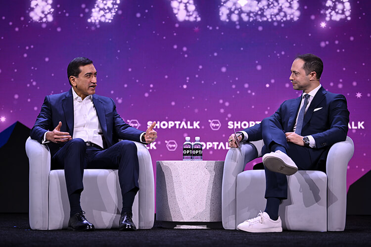 Shailesh Jejurikar and Brian Sozzi seated on the Shoptalk stage in 2024