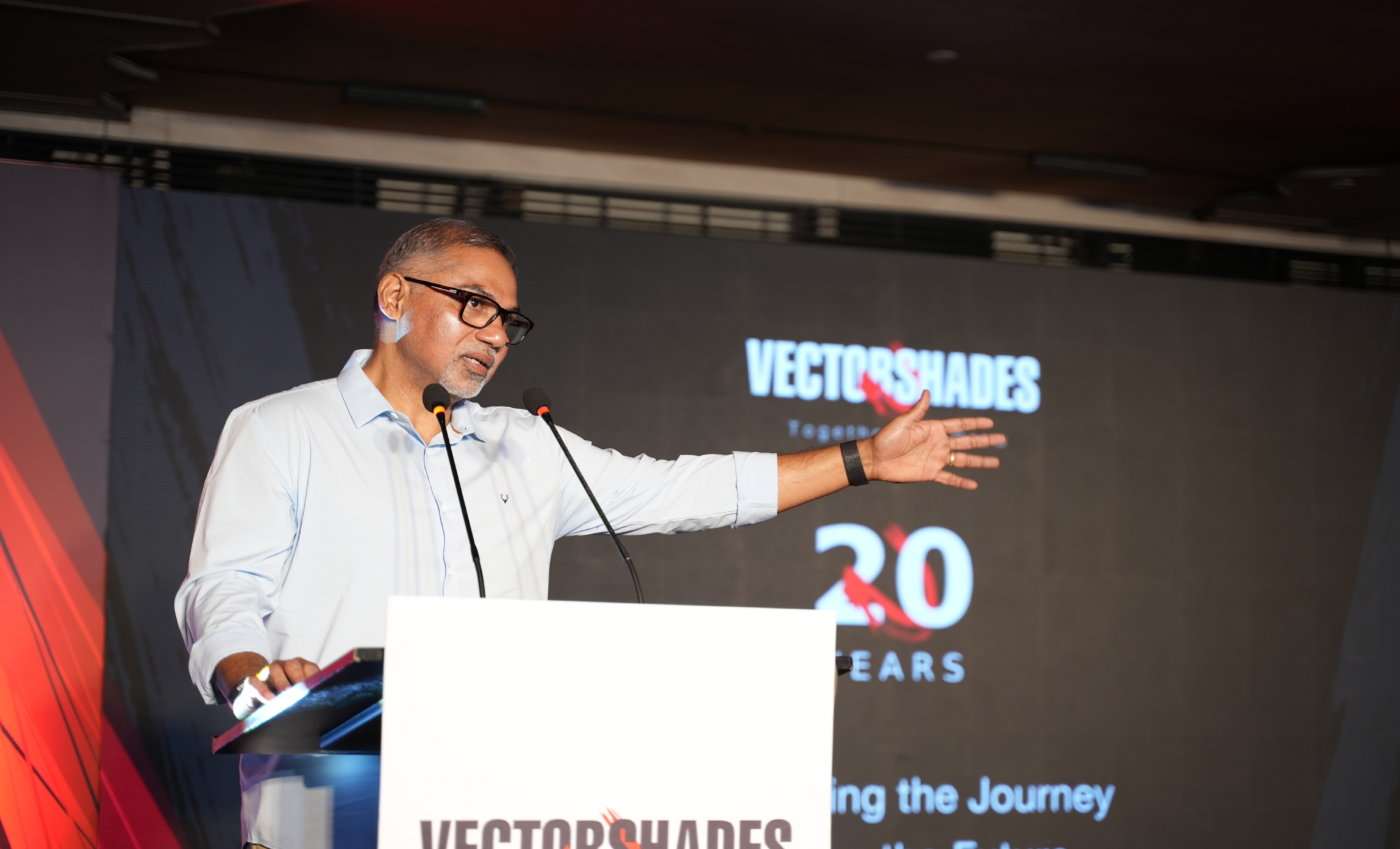Shameem C Hameed speaking at the VectorShades twentieth anniversary celebration