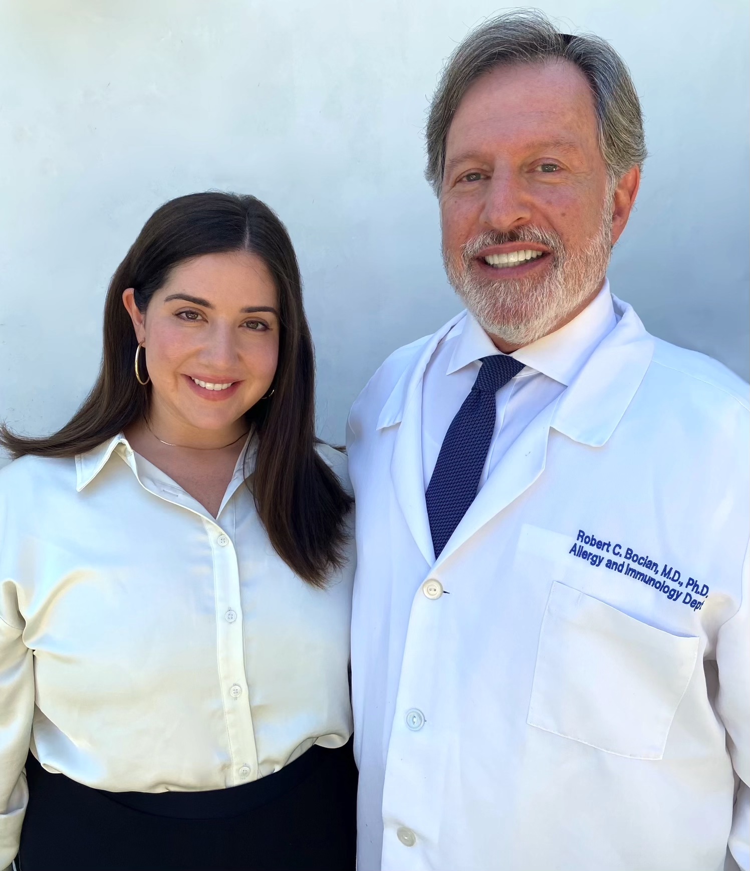 Shani Bocian Steinberg standing beside her father and Allermi co-founder, Robert Bocian