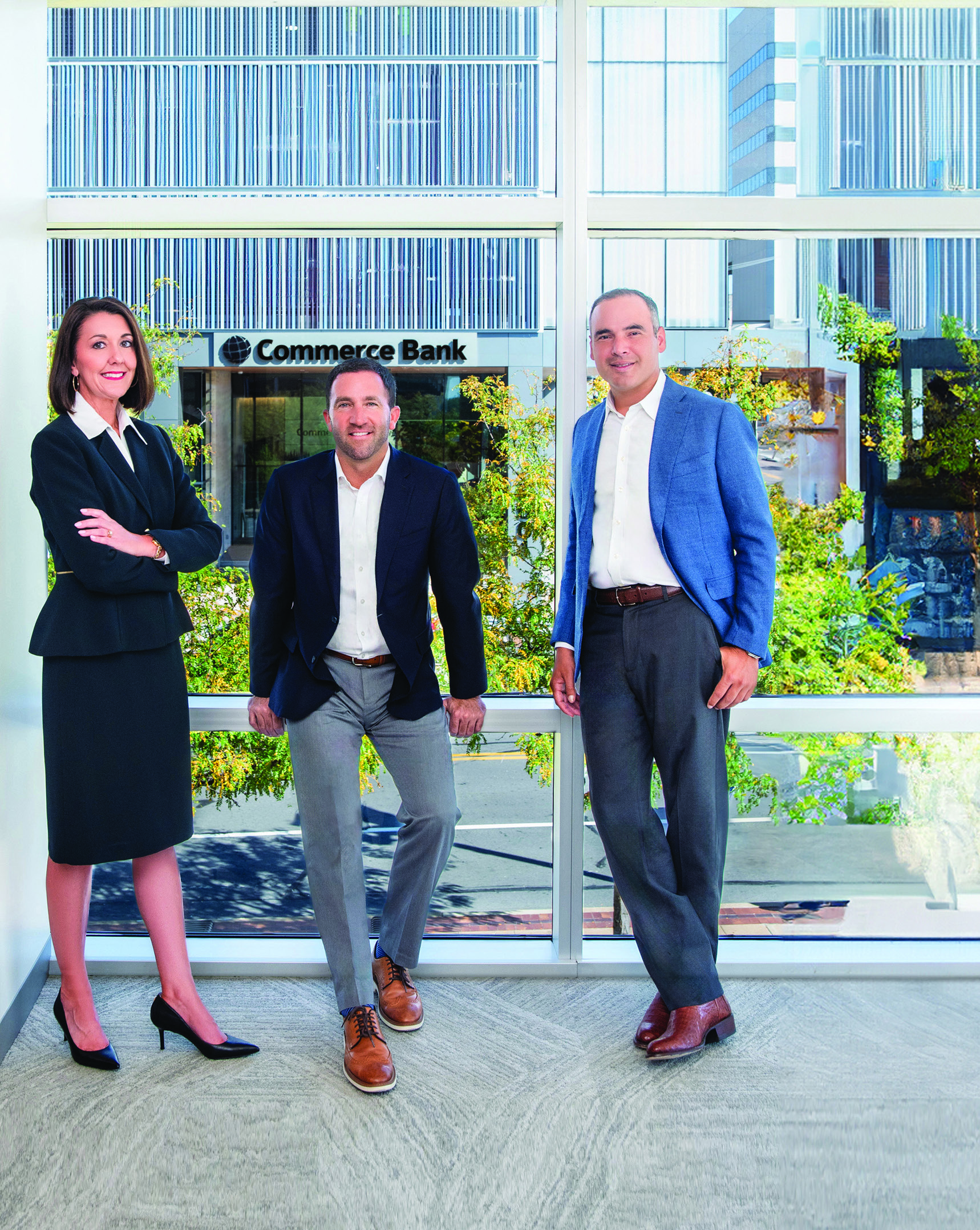 Shannon O’Doherty, John Creamer and Sebastien Solar standing together at Commerce Bank
