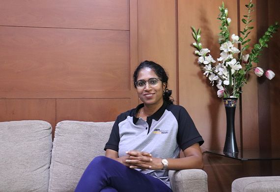 Shirin Hameed seated during an interview at Detroit Engineered Products