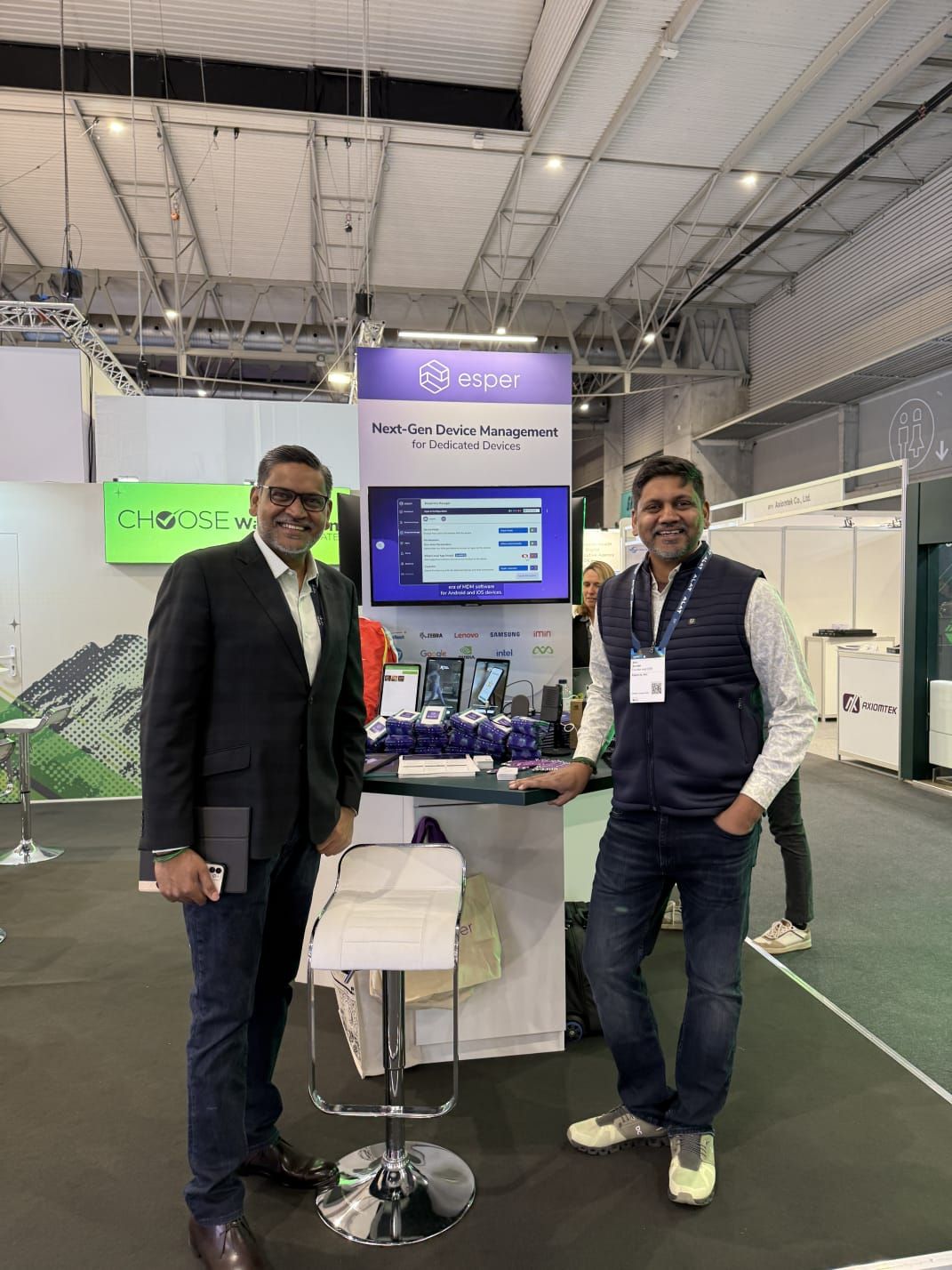 Shiv Sundar and his brother Sendhil Kumar standing at the Esper booth at Mobile World Congress in Barcelona in 2025