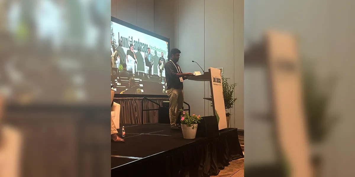 Shiva Dhawan speaking at the Lawn and Landscape Technology Conference in 2024
