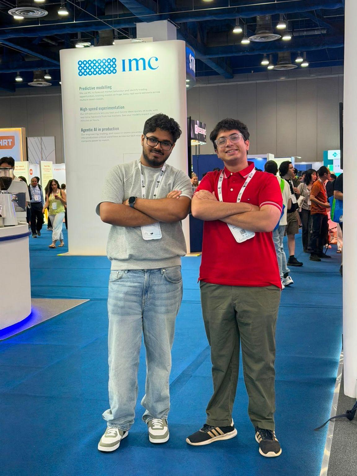 Vansh Ramani, left, and Shourya Vir Jain, right, at a conference exhibition